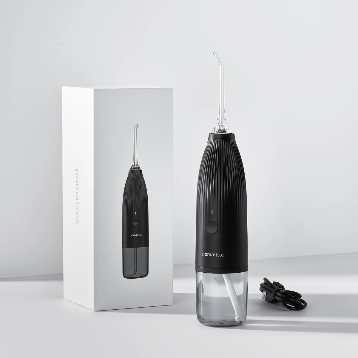 Pomafloss Portable Water Flosser Model 1.0