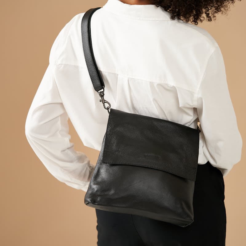 Woodstock leather top sling bag