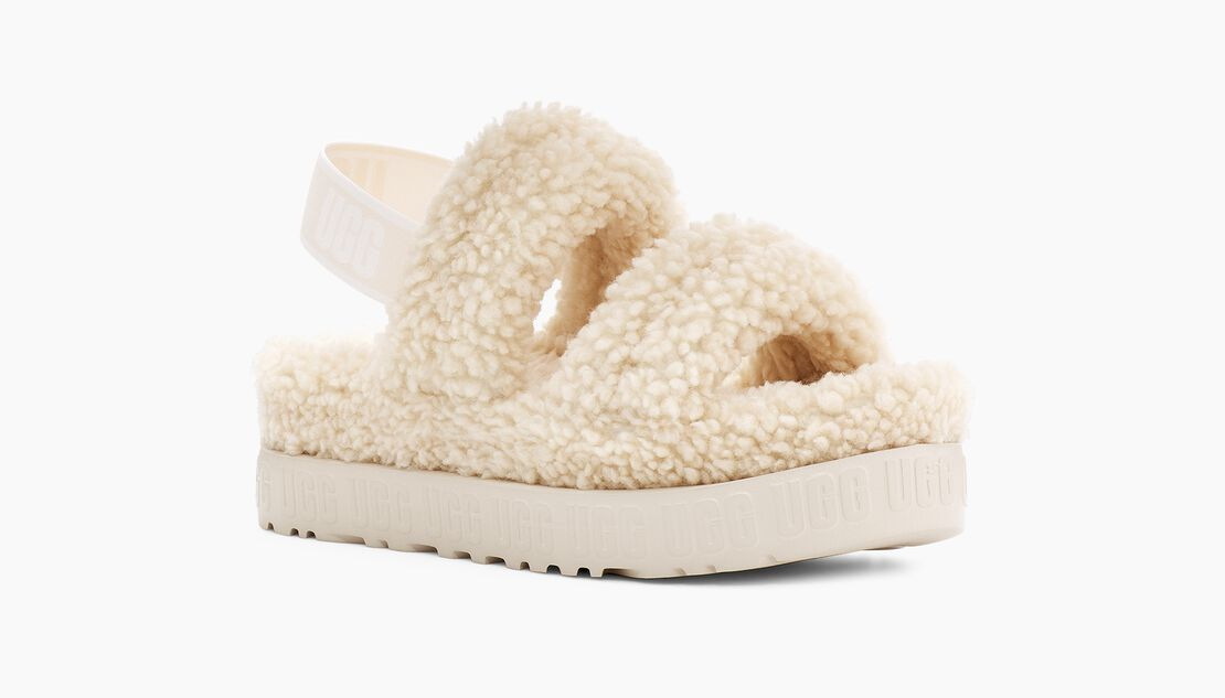 55% off on UGG® Ladies OH Fluffita Slides | OneDayOnly