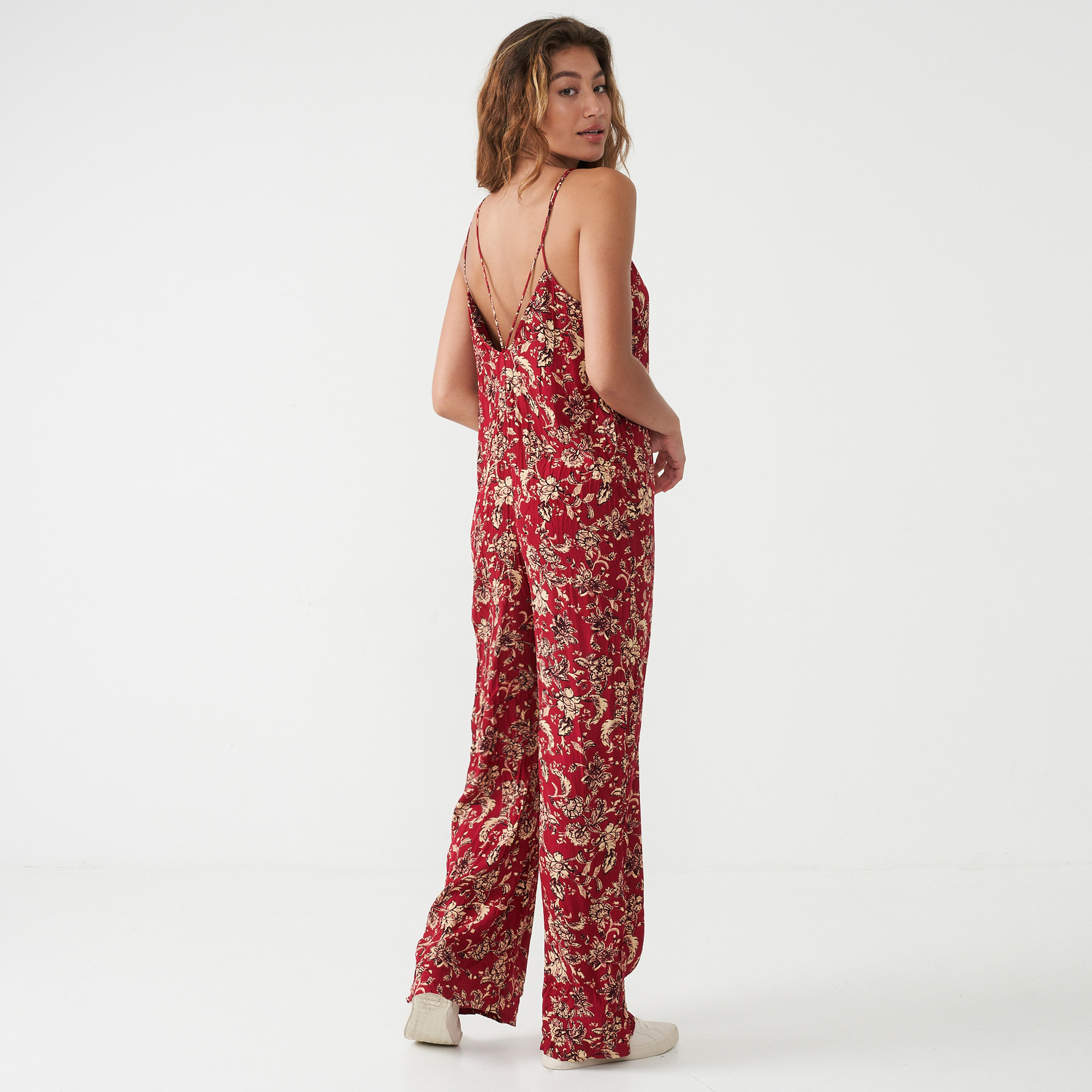 red patterned jumpsuit