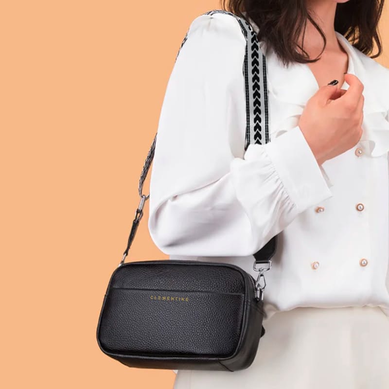 Multi compartment cross body top bag