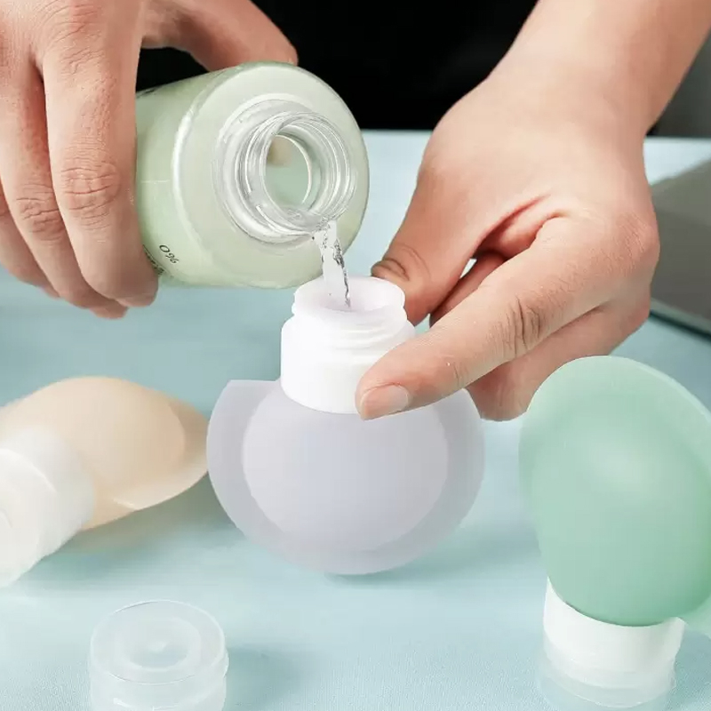 3-Piece Round Silicone Travel Bottle Set with Carry Bag